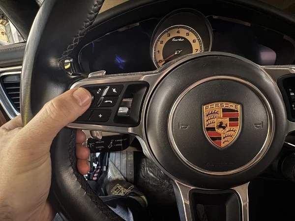 Steering wheel button control